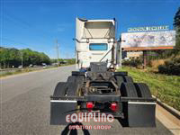 1999 Volvo  VNM64T300 6X4 T/A DAY CAB TRU