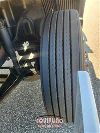 1999 Volvo  VNM64T300 6X4 T/A DAY CAB TRU