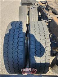 1999 Volvo  VNM64T300 6X4 T/A DAY CAB TRU