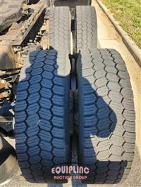 1999 Volvo  VNM64T300 6X4 T/A DAY CAB TRU