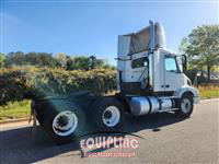 1999 Volvo  VNM64T300 6X4 T/A DAY CAB TRU