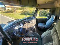 1999 Volvo  VNM64T300 6X4 T/A DAY CAB TRU