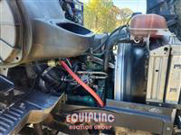 1999 Volvo  VNM64T300 6X4 T/A DAY CAB TRU