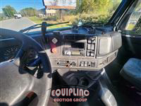 1999 Volvo  VNM64T300 6X4 T/A DAY CAB TRU