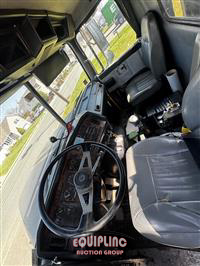 2000 Volvo WG TRI/AXLE FLATBED DUMP TRUCK