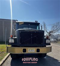 2000 Volvo WG TRI/AXLE FLATBED DUMP TRUCK