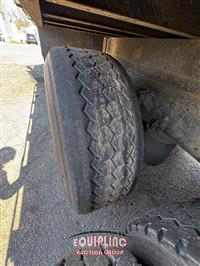 2000 Volvo WG TRI/AXLE FLATBED DUMP TRUCK