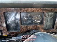 2000 Volvo WG TRI/AXLE FLATBED DUMP TRUCK