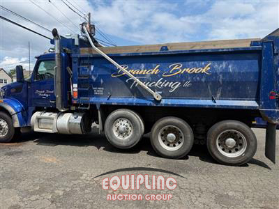 2023 Peterbilt 567 TRI/A DUMP TRUCK TRACTOR