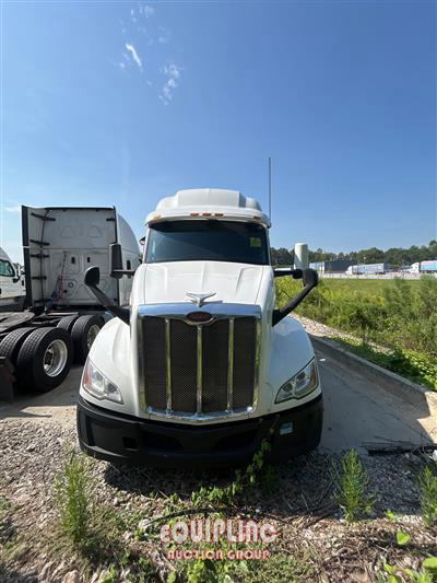 2023 Peterbilt 579 6X4 T/A MID ROOF SLEEPER T