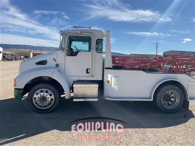 2005 Kenworth T300 4X2 S/A DAY CAB TOTER TRU