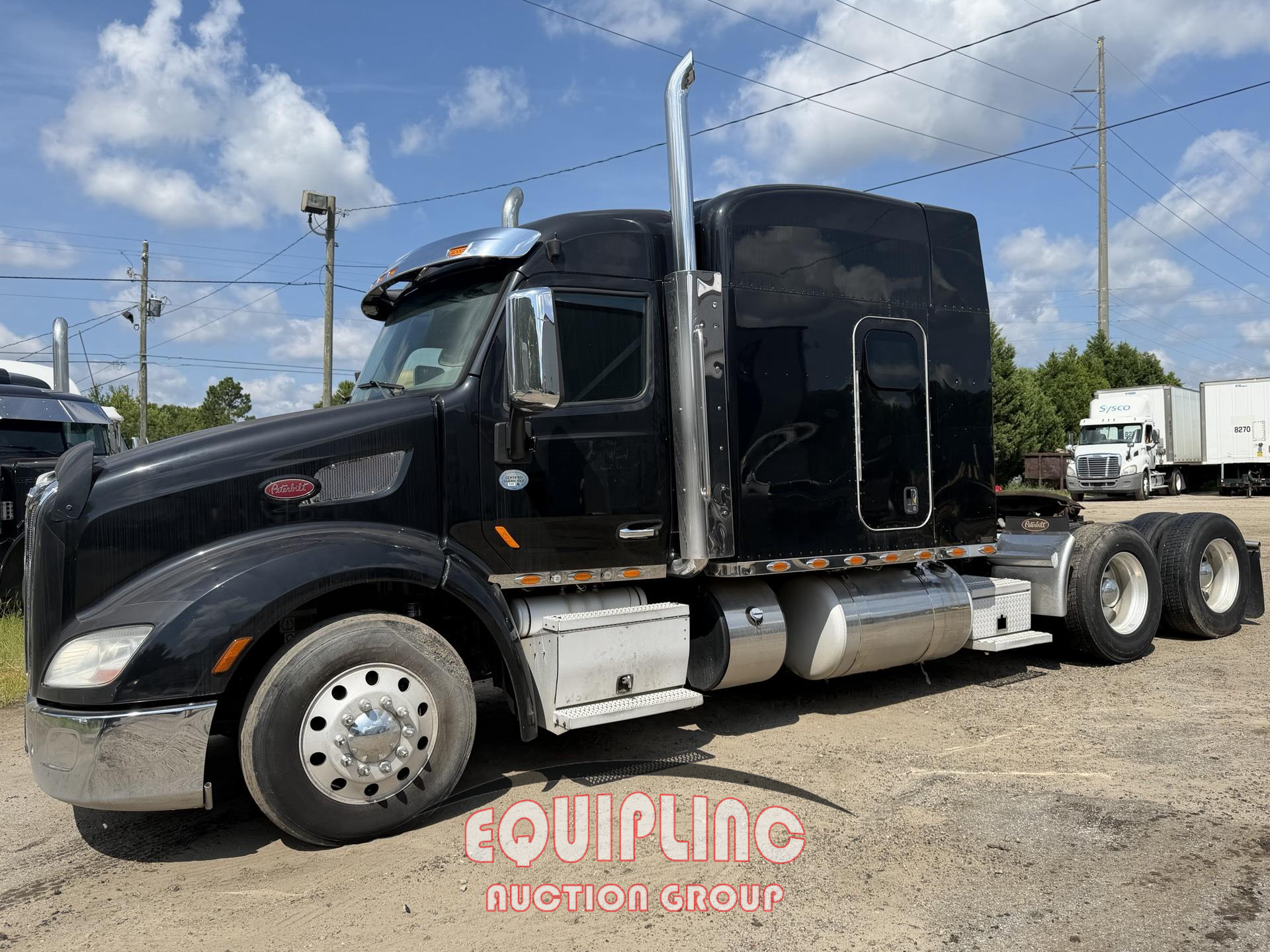 2015 Peterbilt 579 6X4 T/A MID ROOF TRUCK TRA